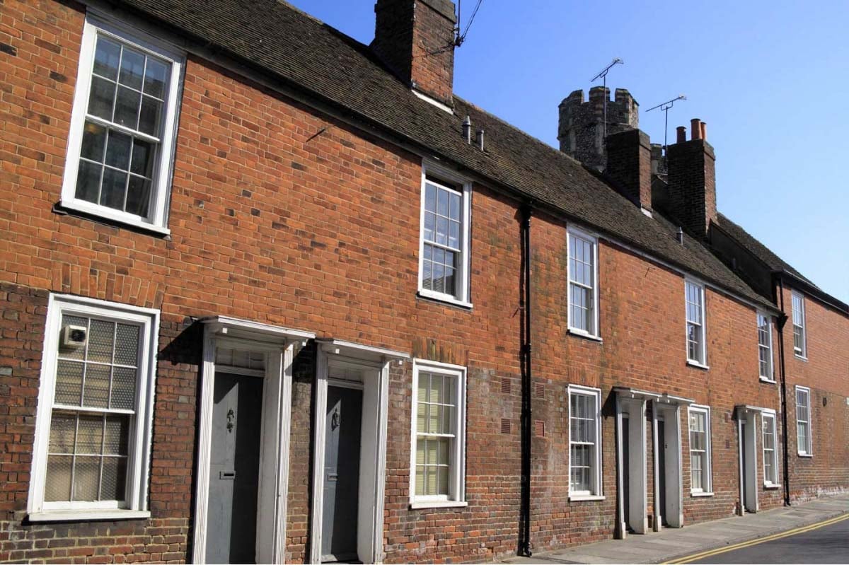 Heritage home with secondary wall insulation to improve efficiency
