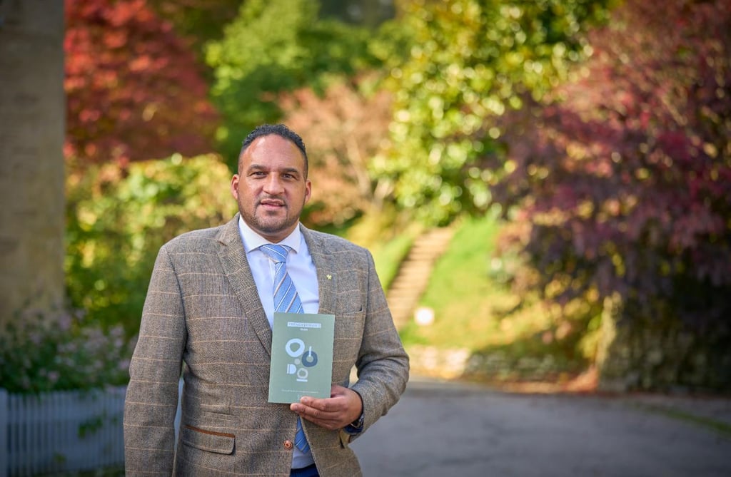 michael caines holding the trencherman's guide