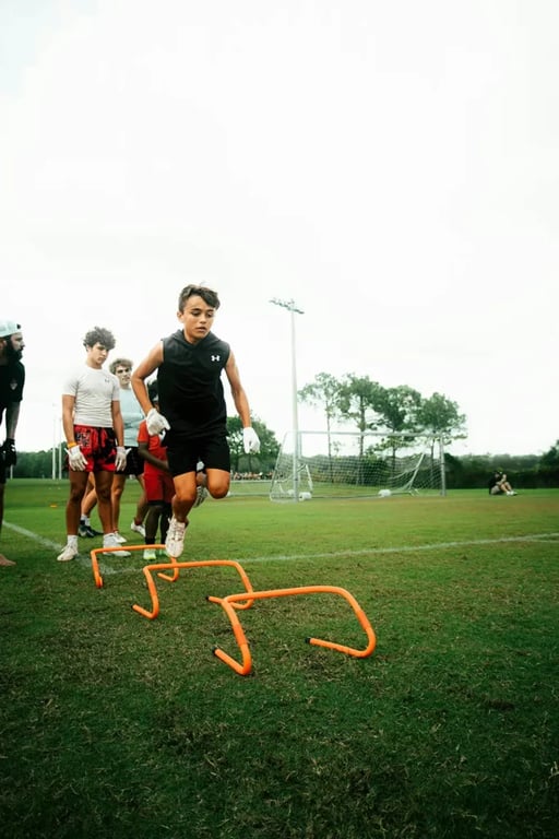 Kids doing soccer training drills