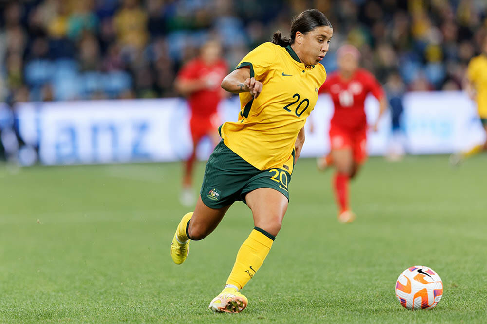 SYDNEY, AUSTRALIA - SEPTEMBER 6: Sam Kerr of Australia runs with the ball during the International Friendly Match between Australia and Canada at Allianz Stadium on September 6, 2022