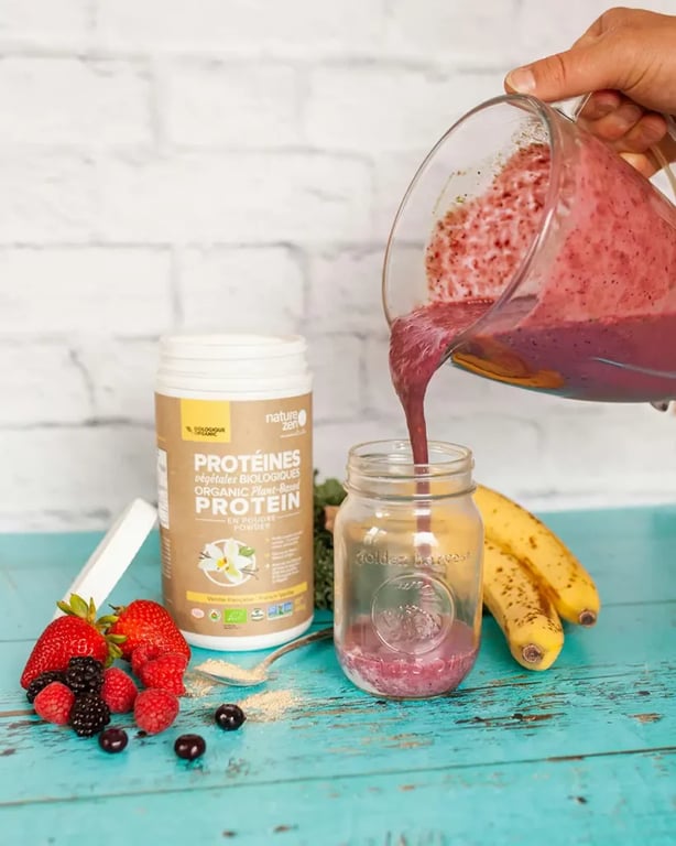 Pouring a smoothie into a jar