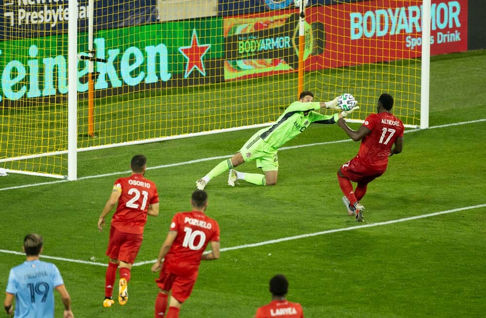 Harrison, NJ - September 23, 2020: Goalkeeper Alex Bono (25) of Toronto FC saves during MLS regular season game against NYCFC at Red Bull Arena