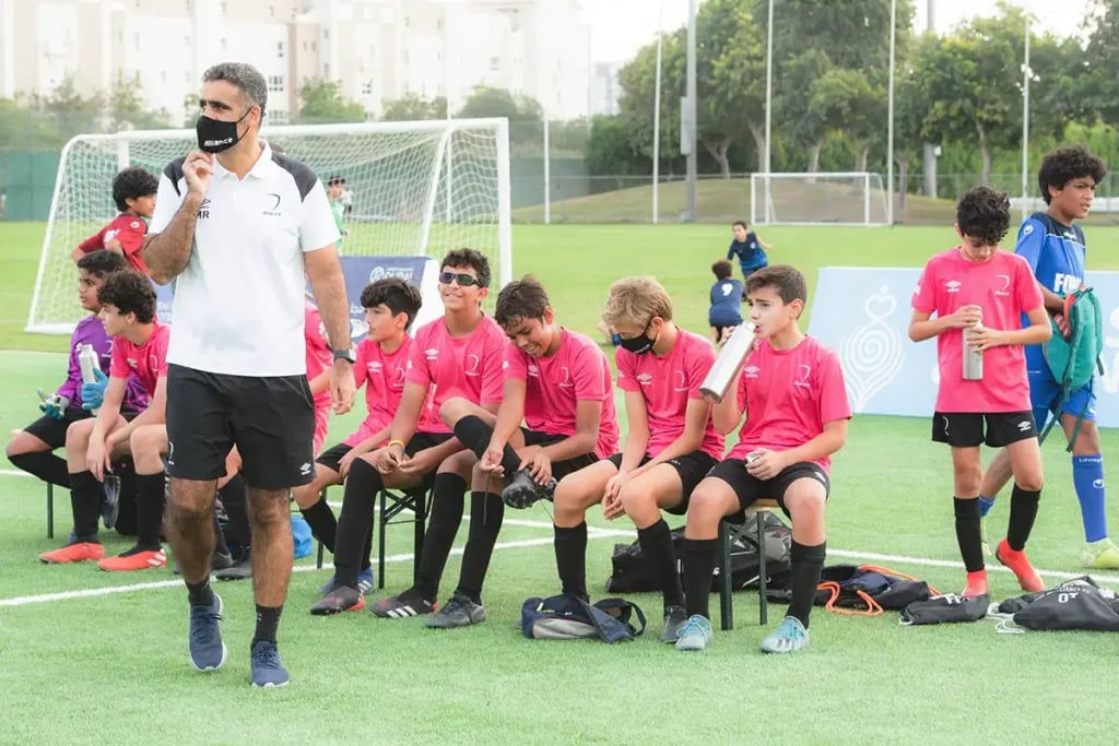 Youth Boys Soccer Team on the sidelines
