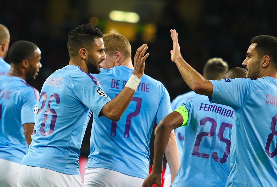 KHARKIV, UKRAINE â€“ 18 SEPTEMBER 2019: Manchester City FC players rejoice in the scoring during UEFA Champions League match Shakhtar - Manchester City at Metalist Stadium
