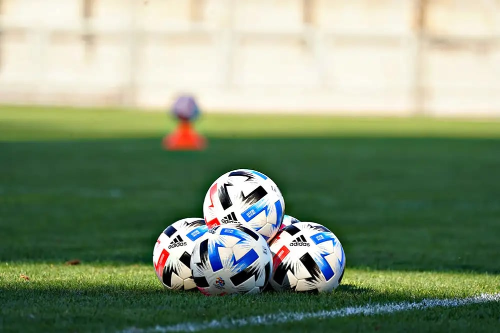 Stack of footballs