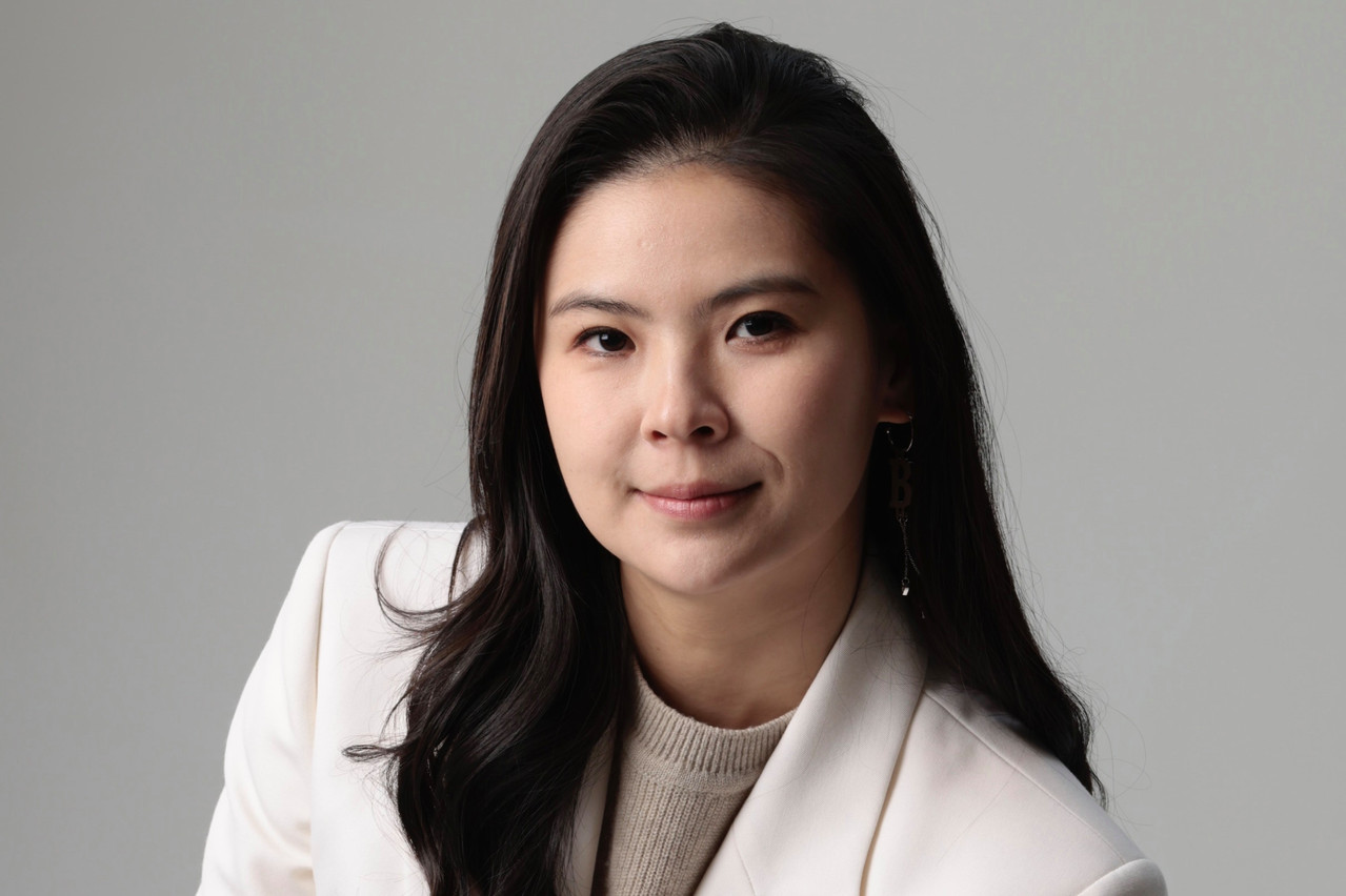 Portrait image of Bitget CEO Gracy Chen used in the section discussing exchange responsibility after the RAVE crash.