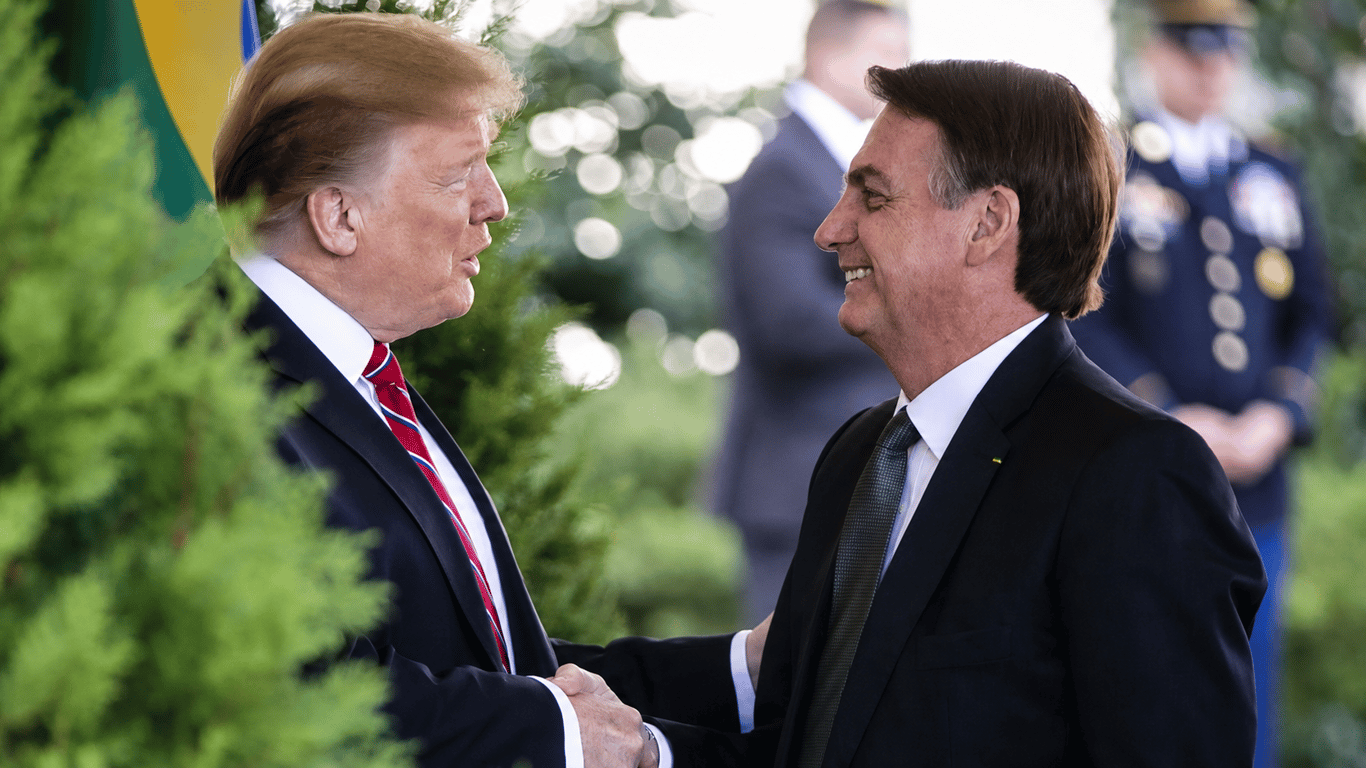 U.S. President Donald Trump and former Brazilian President Jair Bolsonaro pictured side by side.