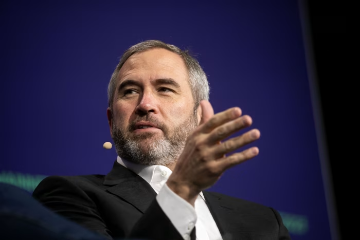 Ripple CEO Brad Garlinghouse discussing Ripple’s institutional expansion after the Hidden Road acquisition.