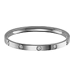 Bangle out of Stainless Steel with zirconia. Width:5,5mm. Diameter:60mm. Shiny. Stone(s) are fixed in setting.