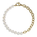 Bracciale elastico con piccole sfere in acciaio inox e charm punto luce turchese Bracciale elastico con piccole sfere in acciaio inox e charm punto luce turchese