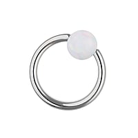 1.6mm Barretta piercing in Metallo chirurgico 316L con Perla sintetica. Filetto:1,6mm. Pallina di chiusura:4mm.