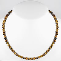 Stone necklace out of Stainless Steel with Tigers eye and nylon. Cross-section:6mm.