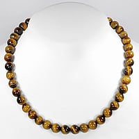Stone necklace out of Stainless Steel with Tigers eye and nylon. Cross-section:10mm.