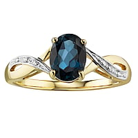 Echtgold Ring mit Blauer Topas und Labor Diamant. Karat:0,0198ct. Breite:6mm. Stein(e) durch Fassung fixiert. Glnzend.