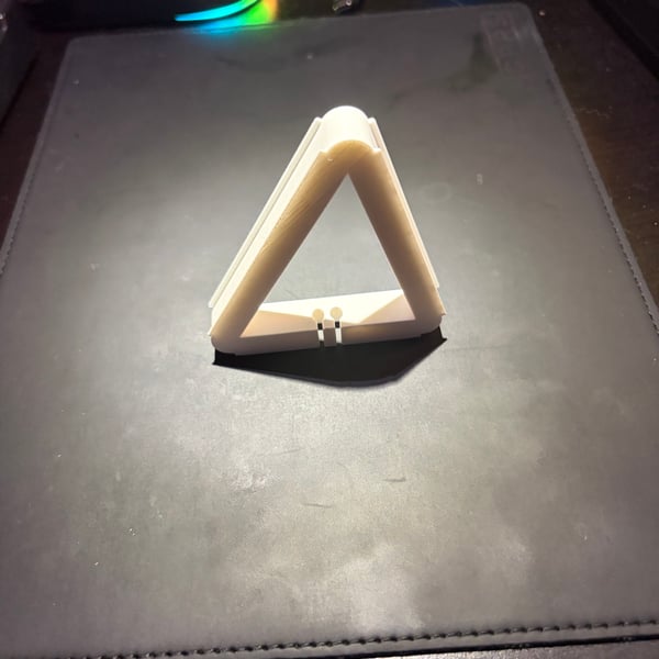 Image 5 of Triangular ear bud storage