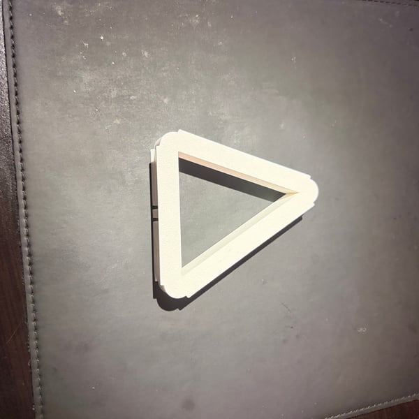Image 6 of Triangular ear bud storage