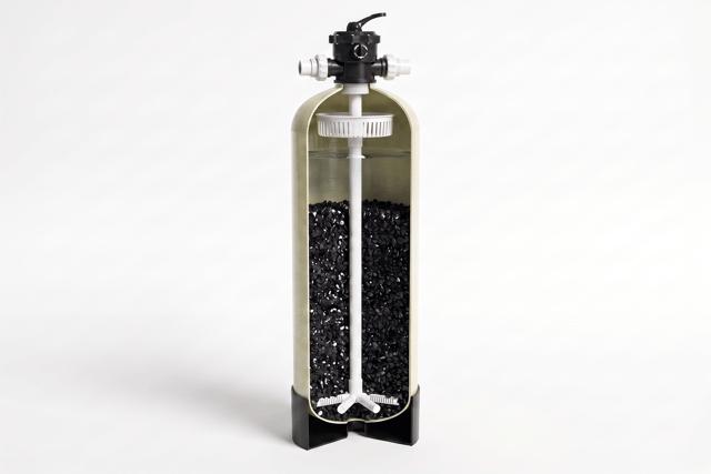 KKE W100 activated carbon filter installed on its skid frame, FRP vessels with multiport valves and pressure gauge