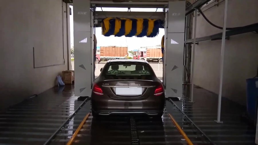 A clean dark saloon on the rails at the end of its wash
