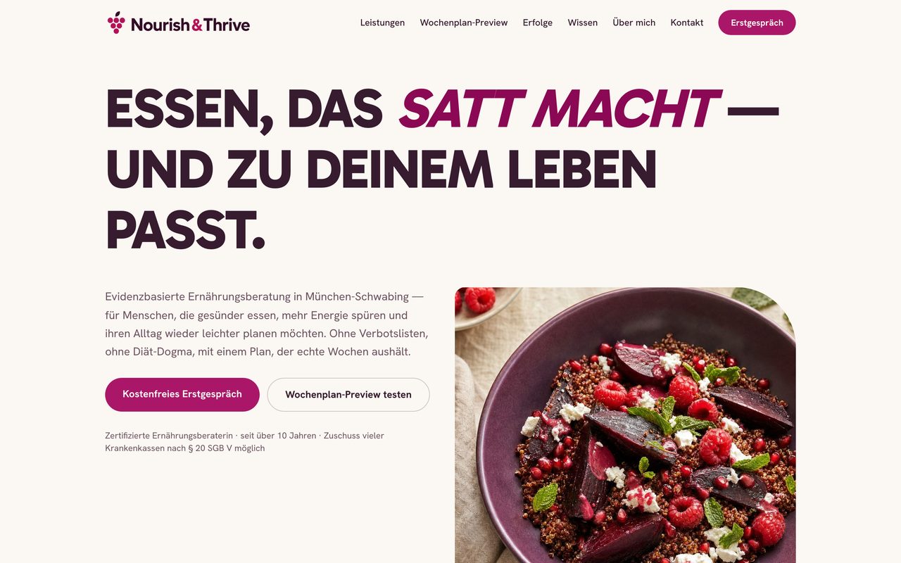 Nourish & Thrive Webseite auf einem Monitor