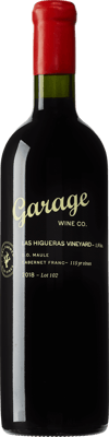 En glasflaska med Garage Wine Las Higueras 2014, ett rött vin från Valle Central i Chile