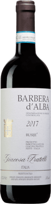 En lättare glasflaska med Barbera d'Alba Busije, ett rött vin från Piemonte i Italien
