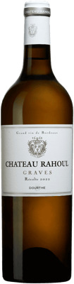 En glasflaska med Château Rahoul Vignobles Dourthe, ett vitt vin från Bordeaux i Frankrike