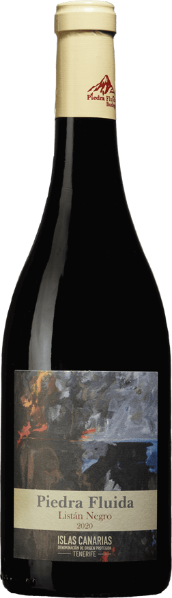 En glasflaska med Piedra Fluida Listán Negro 2020, ett rött vin från Spanien