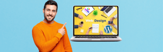 A man is pointing at a laptop with the word web design on it.