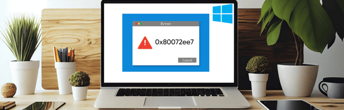 A laptop displaying a Windows 10 error message with Error 0x80072ee7.