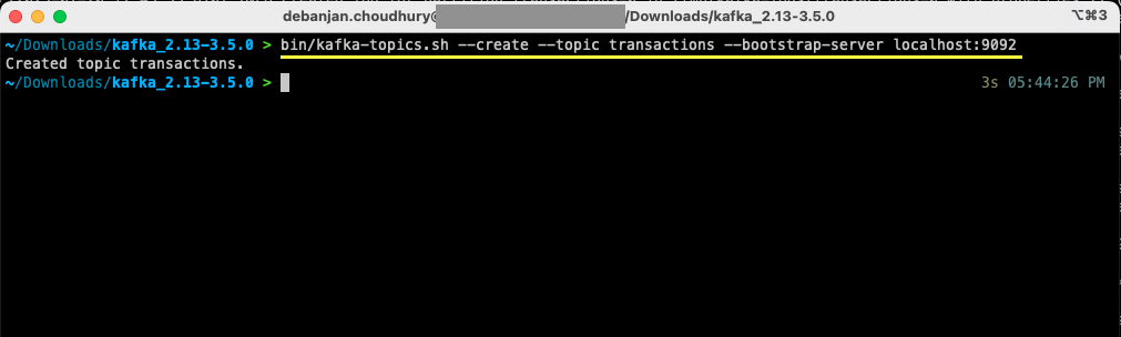 terminal window showing the successful command for creating a kafka topic