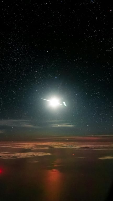 飛行機のコックピットから見た夜空