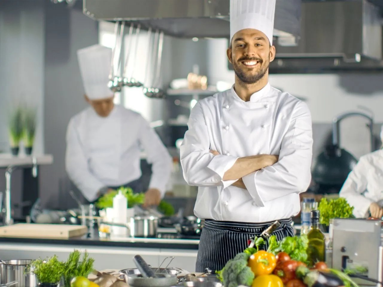 chefe com farda de cozinha
