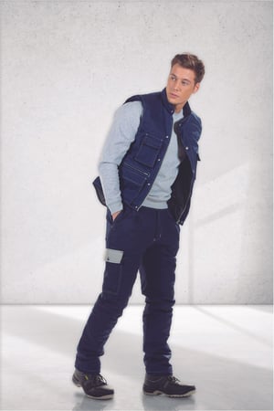 Man wearing a men's padded vest for professional clothing manufactured by Unifardas