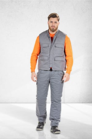 Working in industry wearing a padded men's work vest