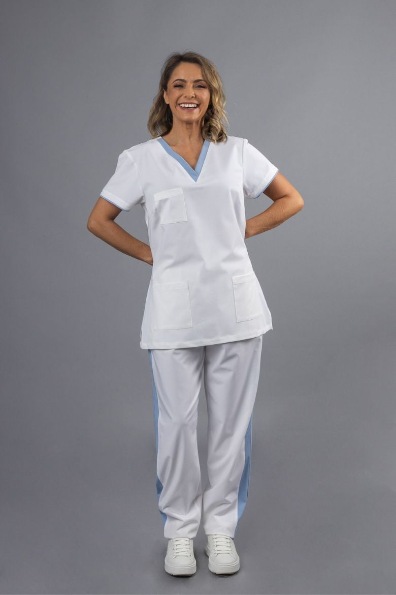 Unifardas Spa Tunic; Health Professional wearing a white Spa Tunic with blue contrast trim for Health and Wellness Uniform.