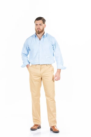 Man dressed in beige work uniform pants to be worn in industrial areas