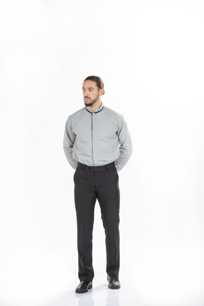Man dressed in a gray tailored work shirt and classic black pants to be worn as a work uniform