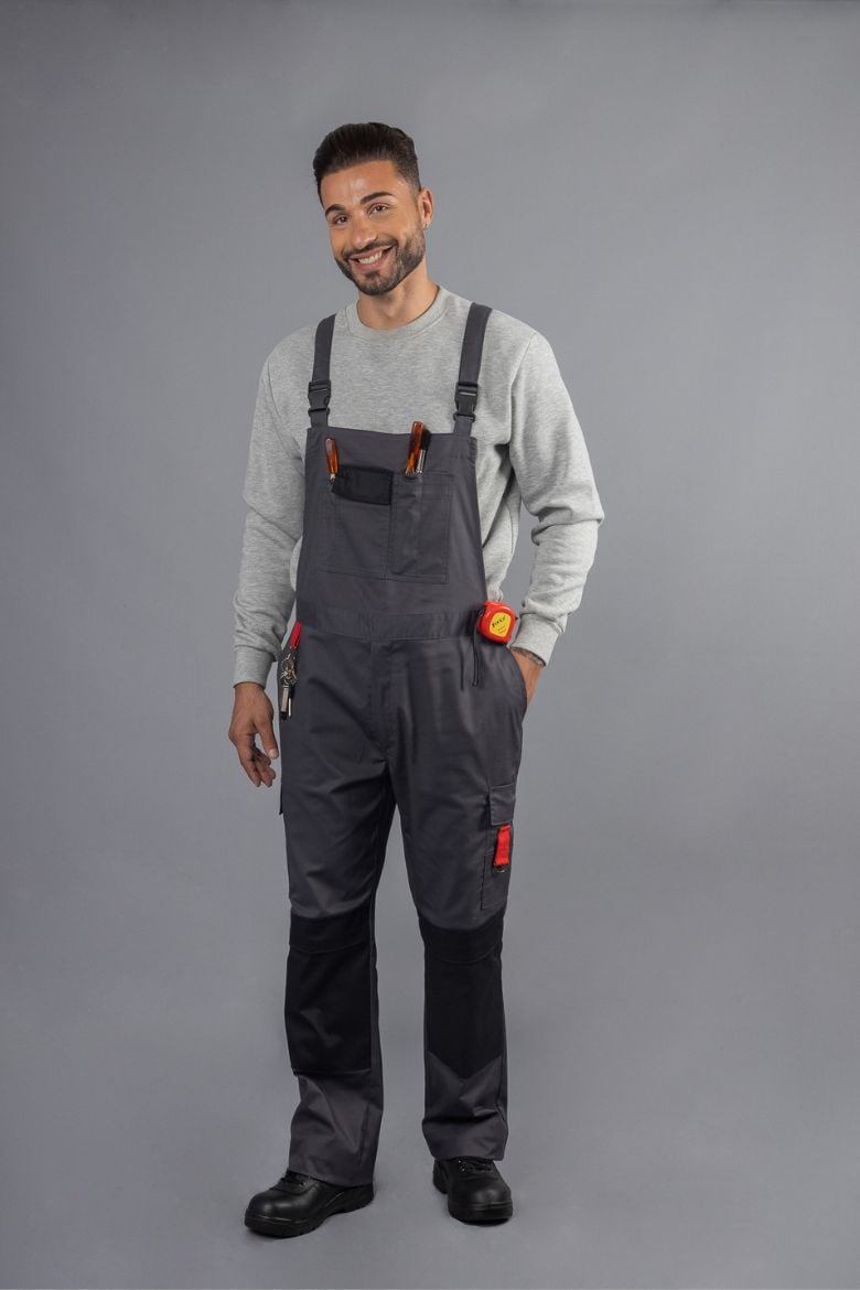 Worker wearing a gray mechanic's overalls