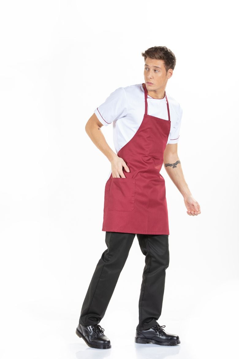 Hotel and restaurant worker wearing a men's custom apron for a work uniform manufactured by unifardas
