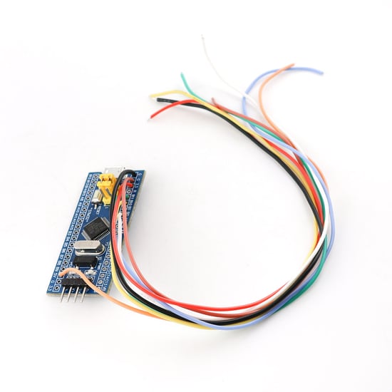 MMC Flash Hardware ECU Recovery Device serves as an interface for connecting to an ECU "on the bench." | Emirates Keys