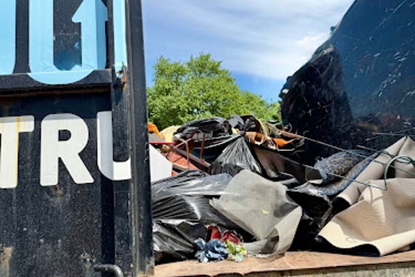 Two Men and a Junk Truck