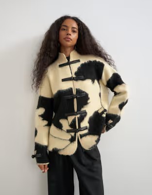 Topshop knitted patterned frogging detail jacket in black and cream