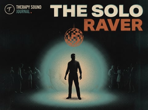 A solo raver on a dark dance floor, lost in the music under stage light.