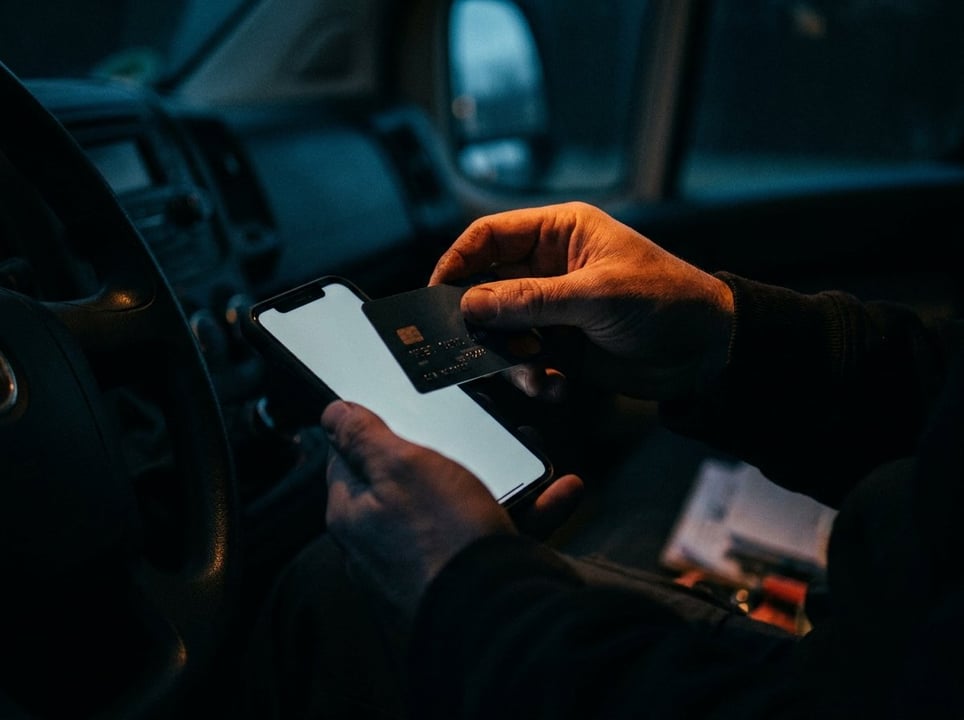 Customer tapping a card on a technician's phone