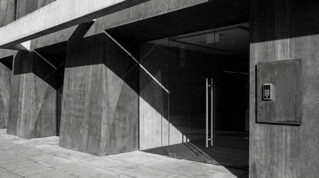 Commercial glass entrance with an access control keypad