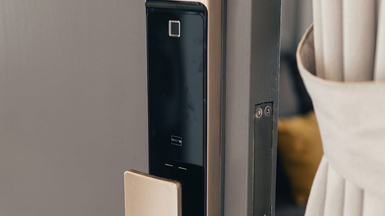 Keyless digital smart lock on a wooden front door
