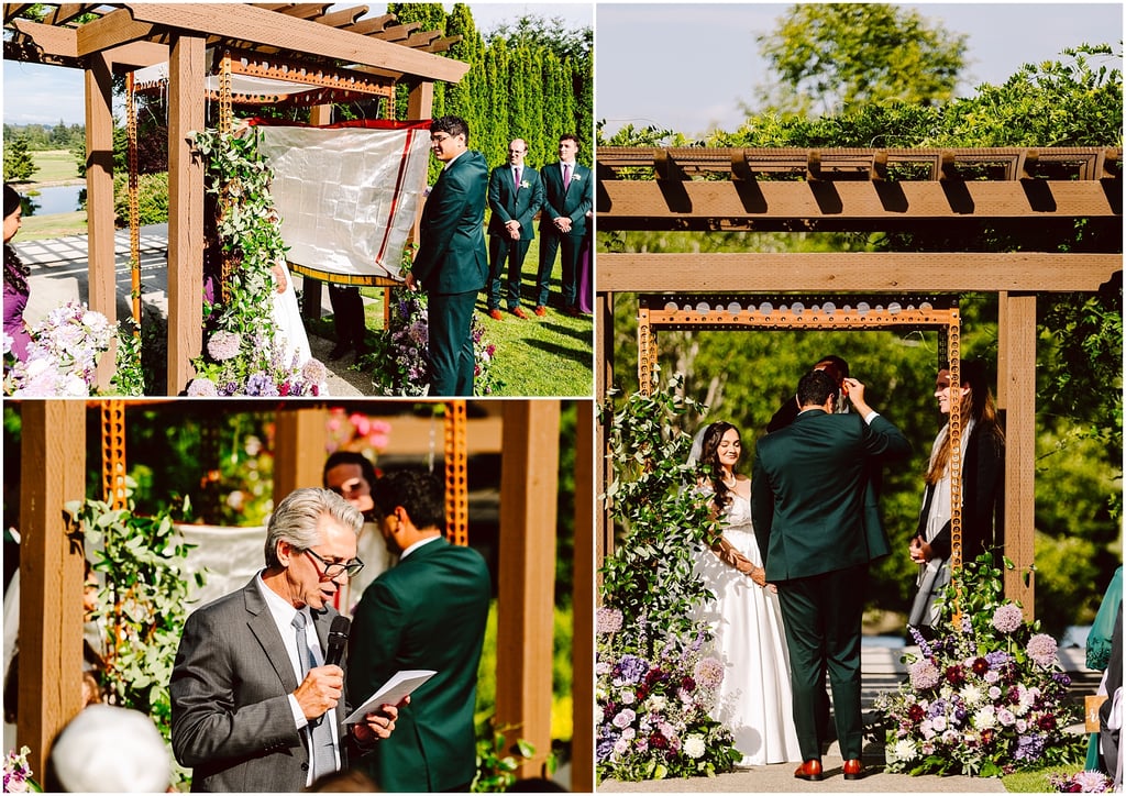 Outdoor wedding ceremony under a wooden arbor; bride and groom facing officiant with bridal party in background, surrounded by floral arrangements
