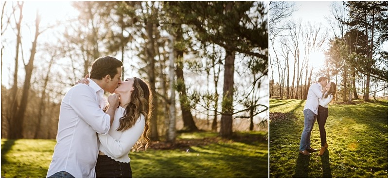 Premier Snohomish & Seattle Wedding Photographer | GSquared Weddings Photography A couple stands in a sunlit park, embracing and kissing beneath tall trees. The light filters through the branches, casting a warm glow on the grassy landscape—perfect for a dreamy Snohomish Seattle wedding engagement moment. 47.9129° N, 122.0982° W | Serving Snohomish, Seattle , Orlando & Beyond