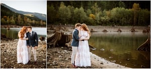 Premier Snohomish & Seattle Wedding Photographer | GSquared Weddings Photography A couple stands by a serene lake near Snohomish, surrounded by trees and mountains, holding hands and embracing. The woman wears a long white dress, the man a suit jacket and light pants. The scene feels calm and romantic—perfect for a Seattle wedding engagement. 47.9129° N, 122.0982° W | Serving Snohomish, Seattle , Orlando & Beyond
