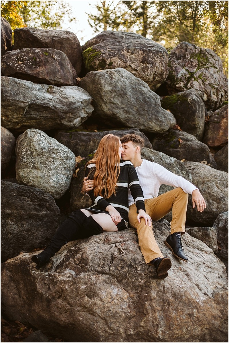 Premier Snohomish Seattle Wedding Photographer | GSquared Weddings Photography A couple sits on large rocks outdoors near Snohomish facing each other closely The woman has long red hair and a striped sweater the man wears a white shirt and khaki pantsthey share an intimate moment during their Seattle engagement 479129° N 1220982° W | Serving Snohomish Seattle Orlando Beyond Premier Snohomish & Seattle Wedding Photographer | GSquared Weddings Photography A couple sits on large rocks outdoors near Snohomish facing each other closely The woman has long red hair and a striped sweater the man wears a white shirt and khaki pantsthey share an intimate moment during their Seattle engagement 479129° N 1220982° W | Serving Snohomish Seattle Orlando & Beyond